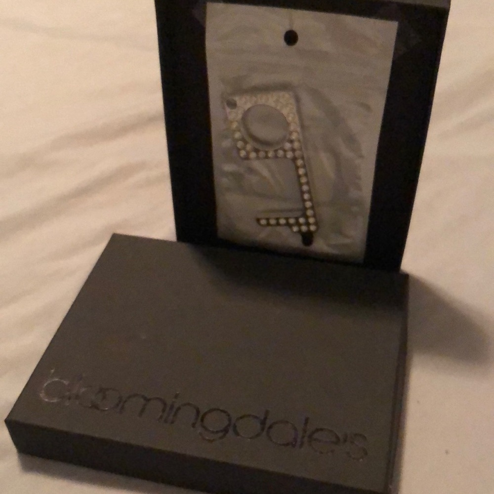 Bloomingdales touch less key   Unopened.